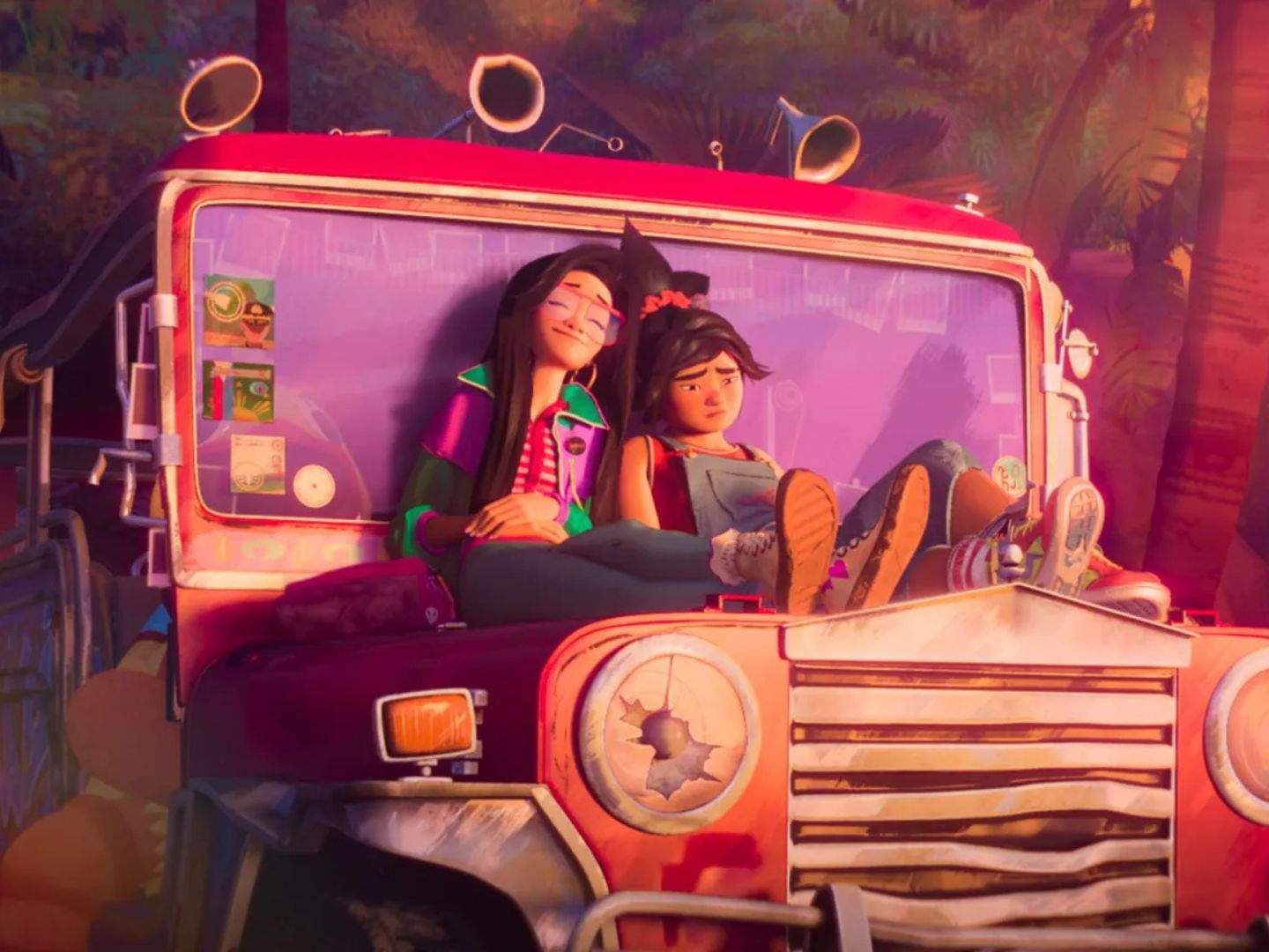 Jo comforts a sad Raissa as they sit together on the hood of a weathered red jeepney in the middle of a lush tropical forest, sharing a quiet moment as warm sunlight filters through the trees.
