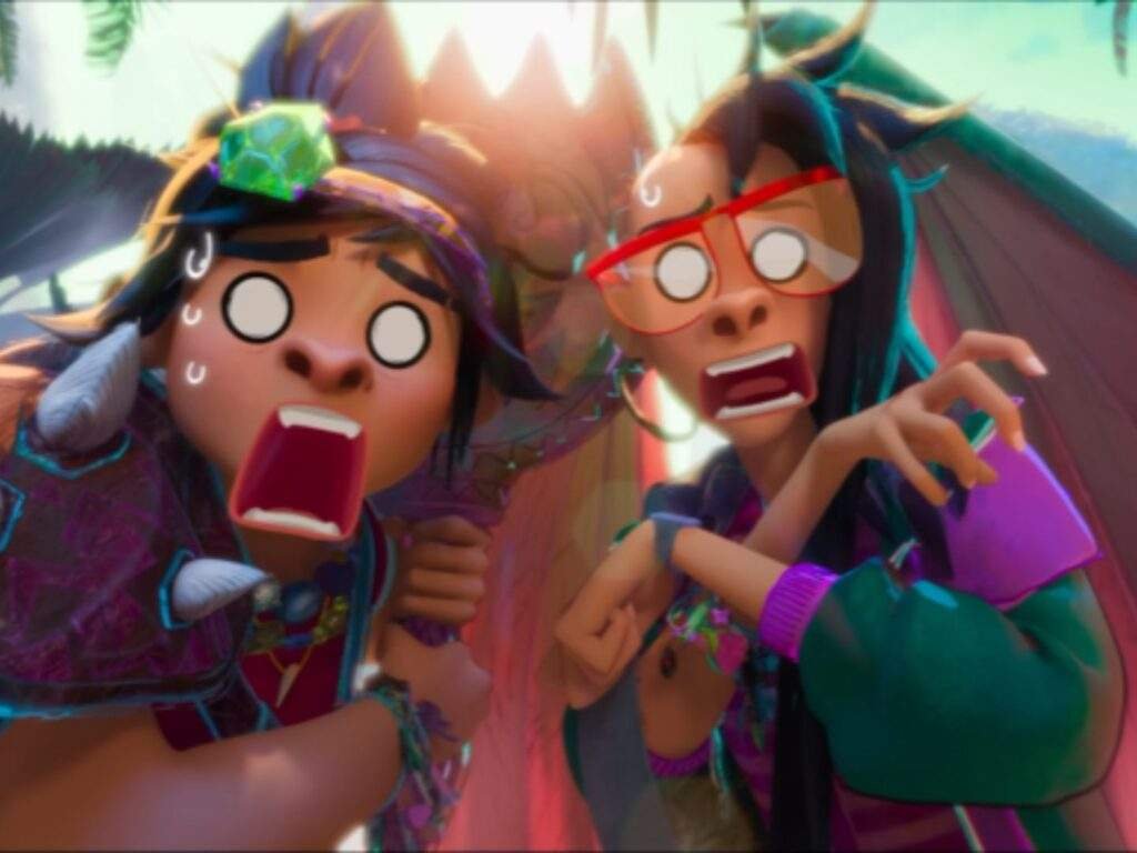Jo and Raissa stare ahead with exaggerated, anime-inspired expressions of shock, clutching each other as they react to something alarming off-screen.