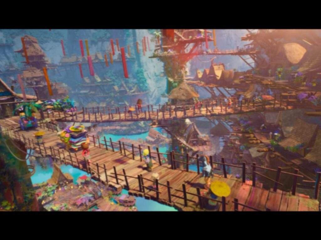 A colorful view of Nakali Island shows wooden bridges connecting treehouse-style homes above bright blue water, with tropical plants, hanging banners, and lively village details creating a vibrant island community.